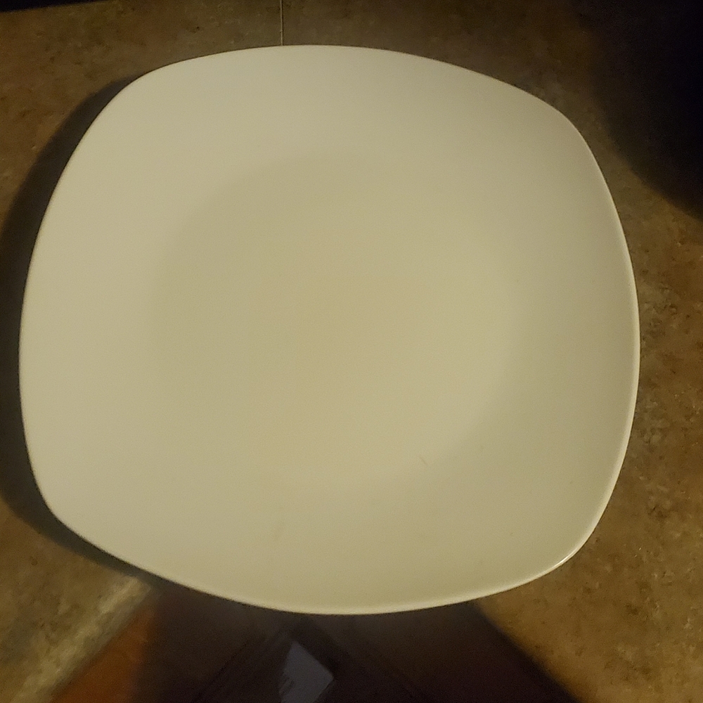 4 piece set of white plates
